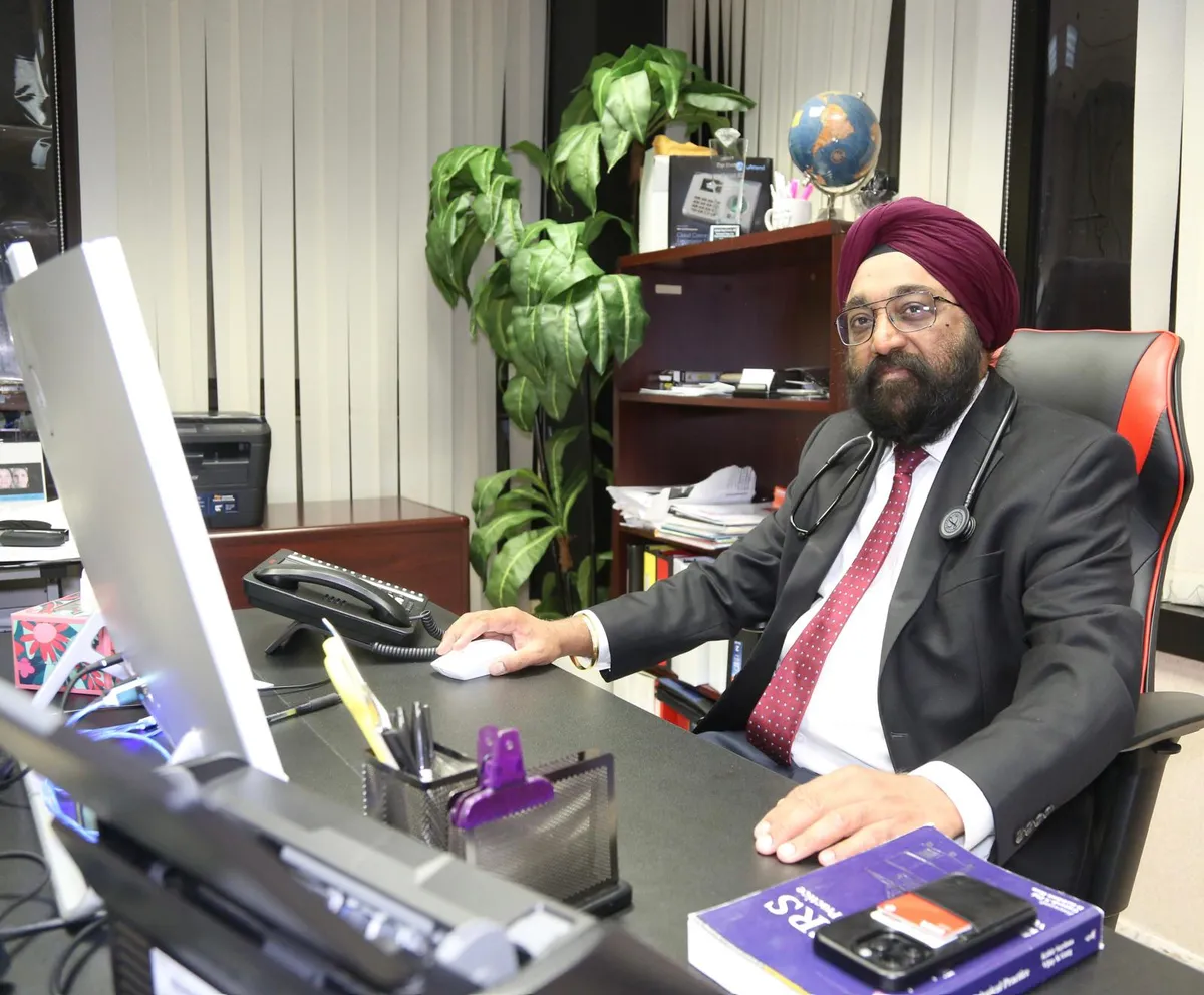 Dr. Inderjit Singh Kainth, MD, founder of Brunswick Internal Medicine Group, in his office