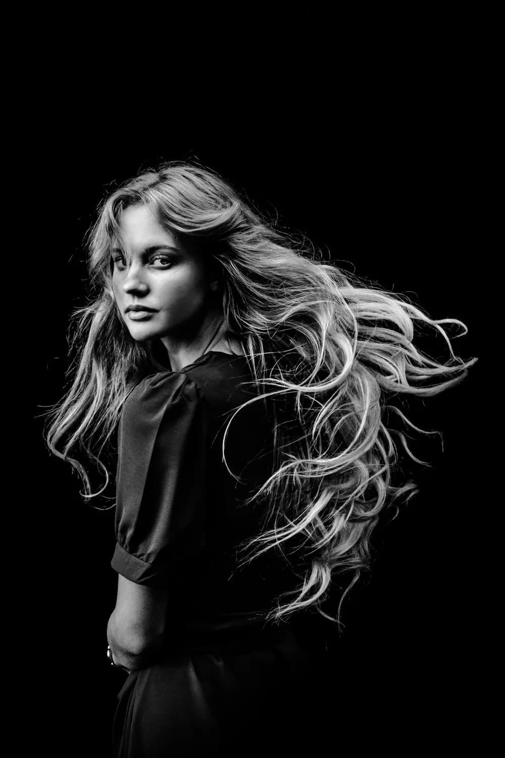 Editorial portrait highlighting healthy, full hair